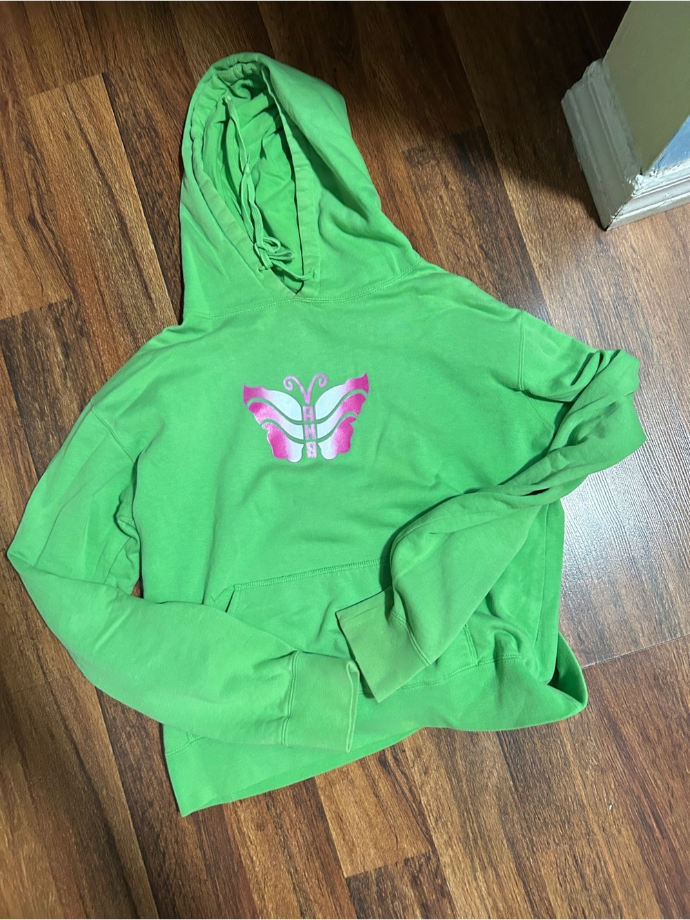 Green Vans Hoodie with Pink Butterfly Graphic